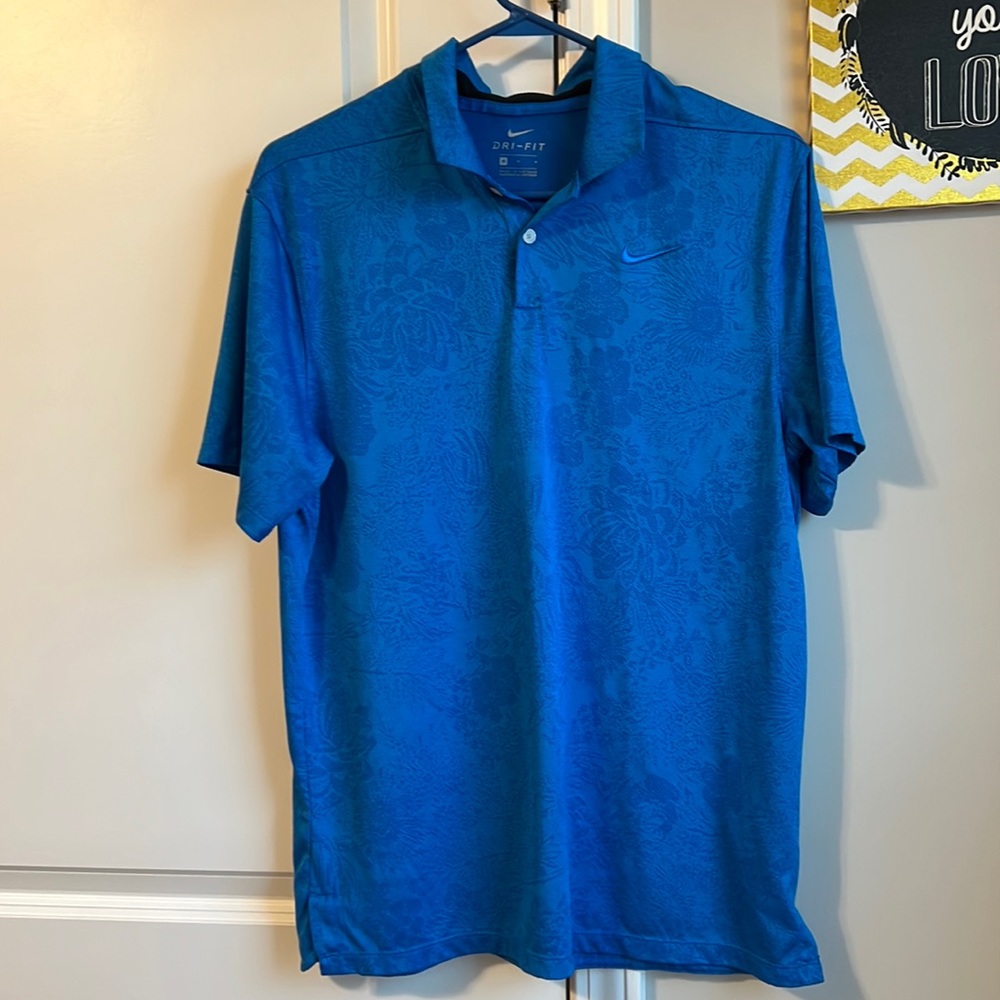 Mens Nike Dri fit polo with floral design and mesh accent under collar